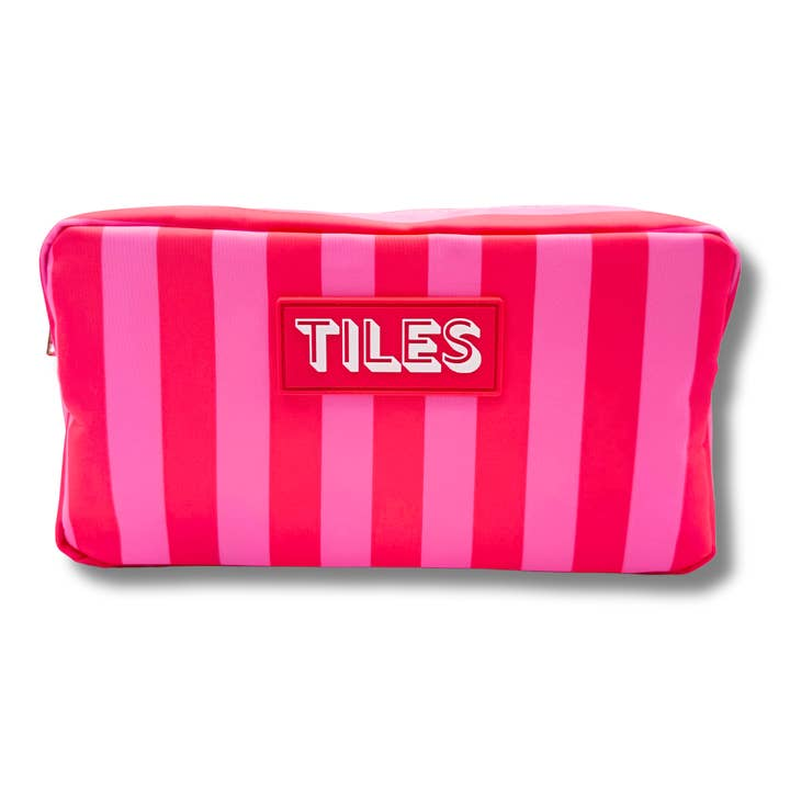 Pink and red striped mahjong tile bag with a red rubber patch that says TILES in white.