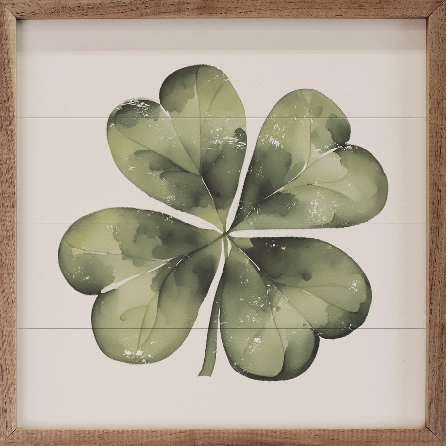 Hand-painted white four-leaf clover on American hardwood with a natural walnut frame.