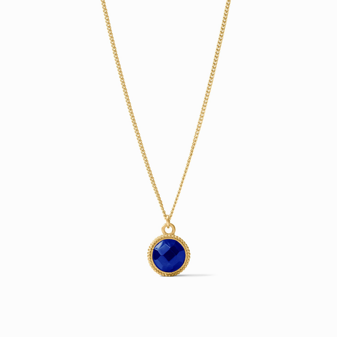 Fleur-De-Lis Solitaire Necklace in 24K gold plate with a round, faceted blue glass pendant.