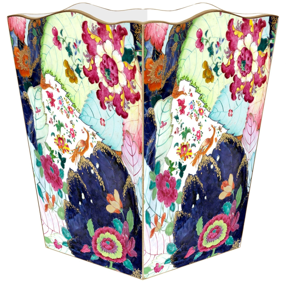 Scalloped top wastepaper basket with a vibrant floral and bird pattern in pink, blue, and green.