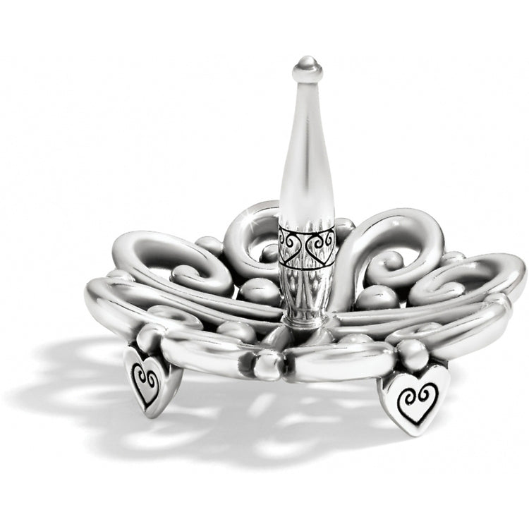 Silver-plated Alcazar ring holder with a central post and heart-shaped feet.