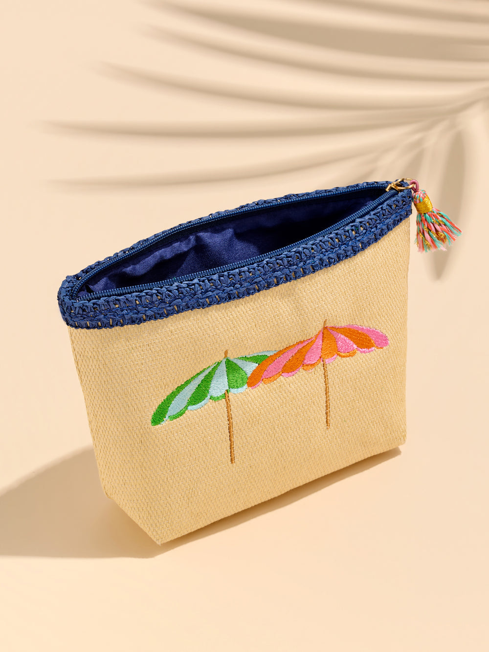 Capri Zip Pouch in natural paper straw with coordinating tassel zipper pull