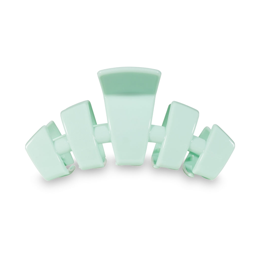 Large classic hair clip with bendable teeth designed for thick hair.