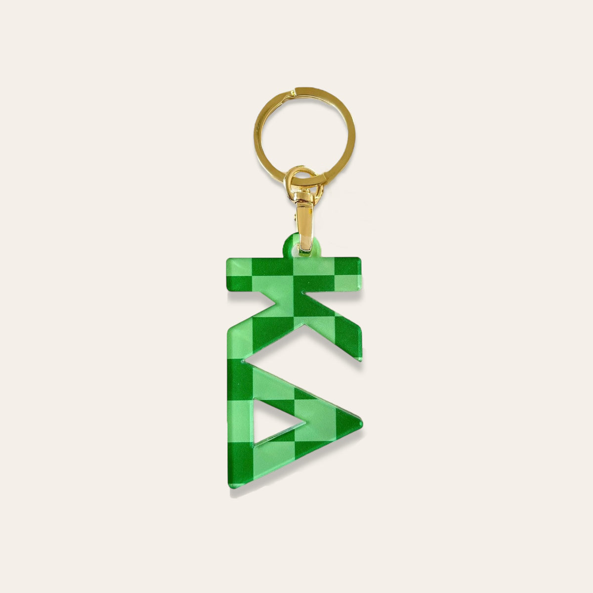Acrylic sorority letter keychain with a glossy finish.