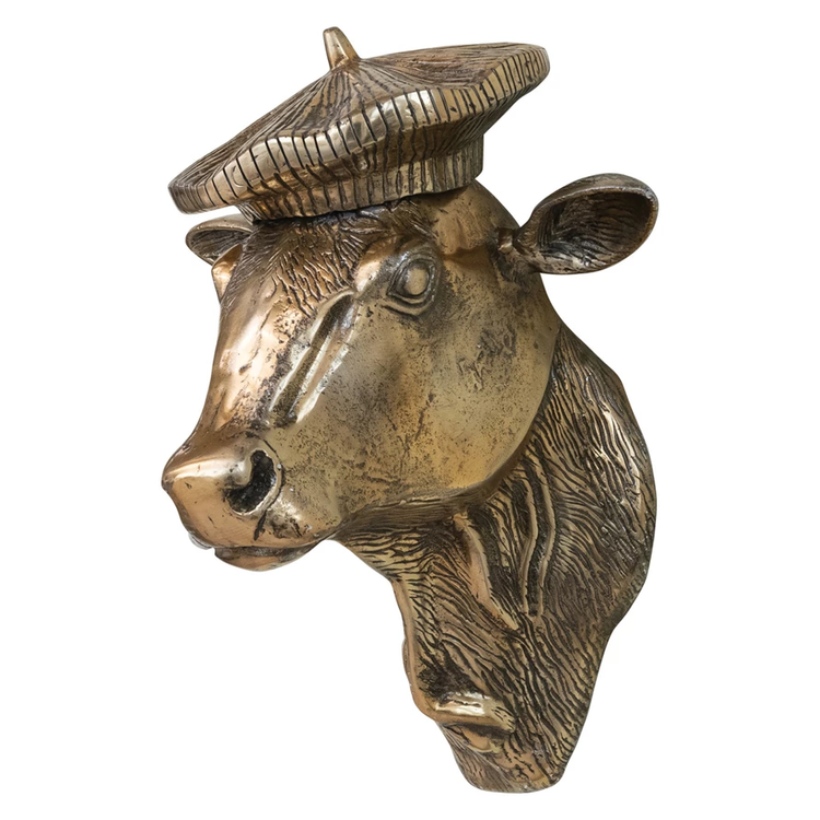 Cast aluminum cow head wall décor with a bronze finish, wearing a textured beret.