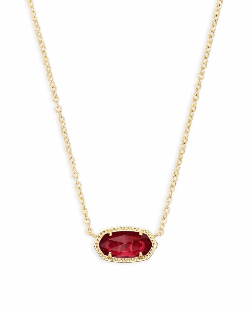 Gold Elisa Short pendant necklace with clear berry stone on a chain.