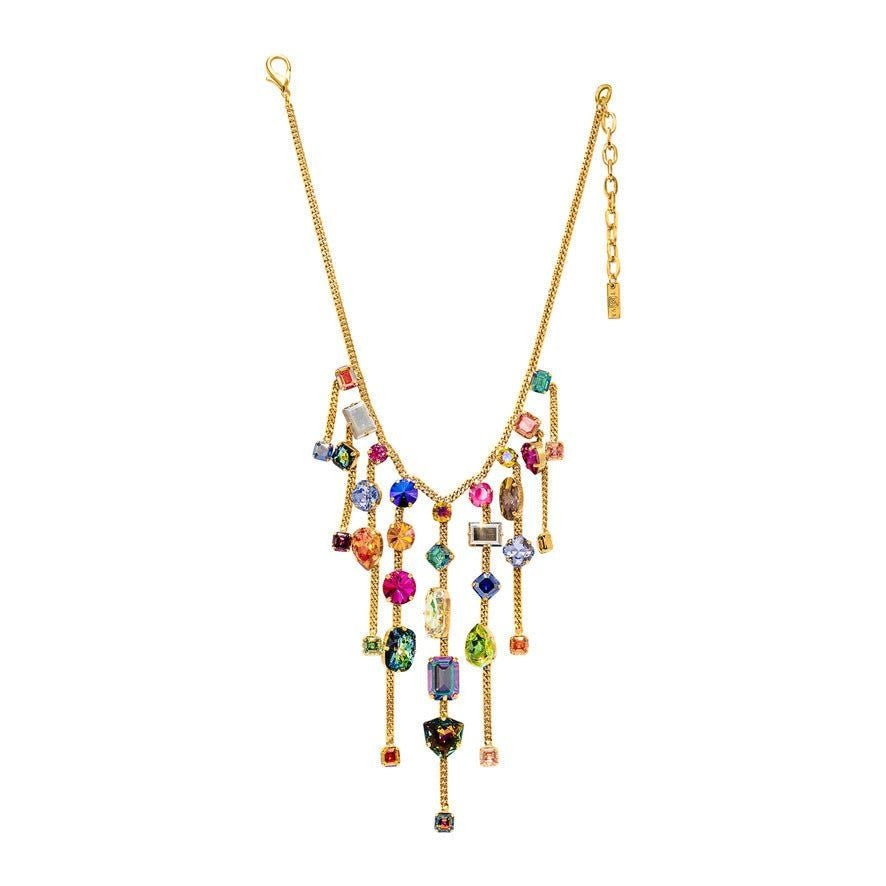Ella Necklace: a delicate gold-toned chain with a small pendant.