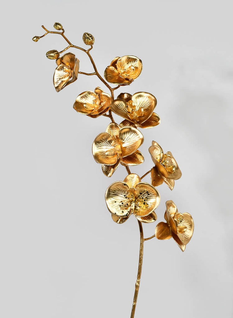 Metallic gold artificial Phalaenopsis orchid stem with realistic flower silhouette.