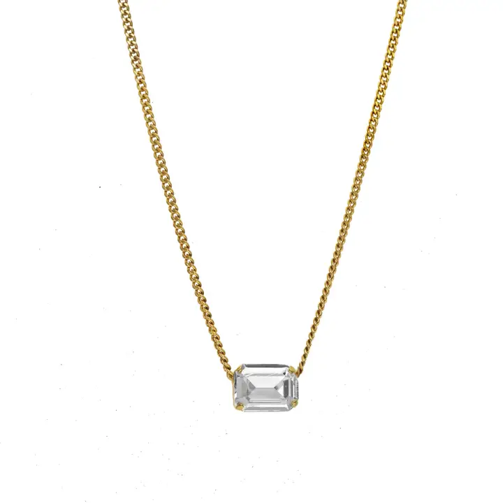 Rubin Necklace in Clear featuring a gold chain and an emerald-cut clear crystal pendant.