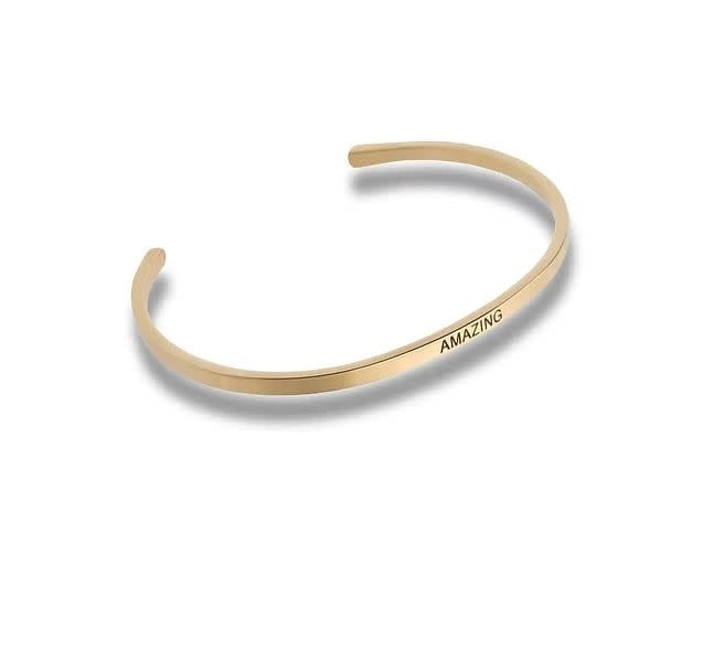 Gold metal link bracelet with a polished finish.