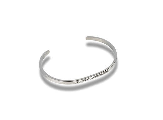Silver chaos-patterned bracelet with a coordinating charm.