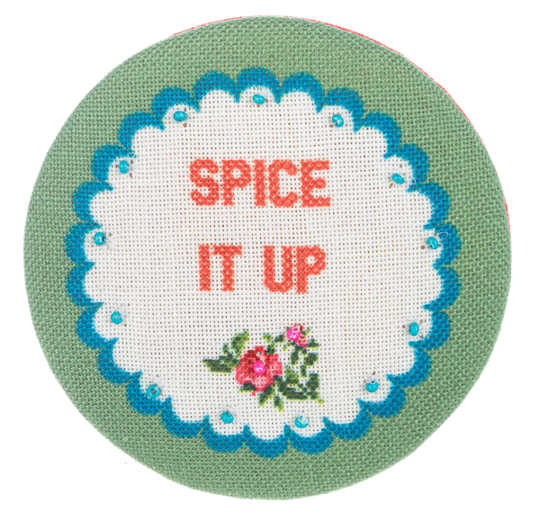 Multi-colored embroidered compact mirror with a cheeky chic floral pattern on the lid.