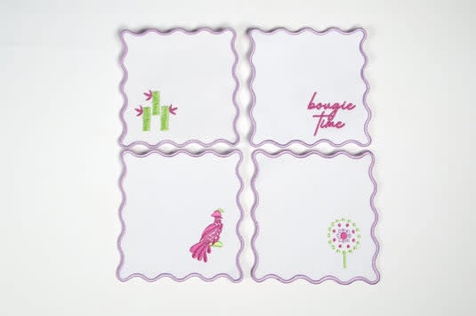 White linen embroidered cocktail napkins with colorful Mahjong tile designs