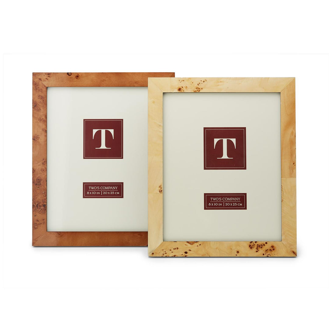 High gloss black burled wood photo frame holding an 8x10 inch photograph with soft velvet backing.