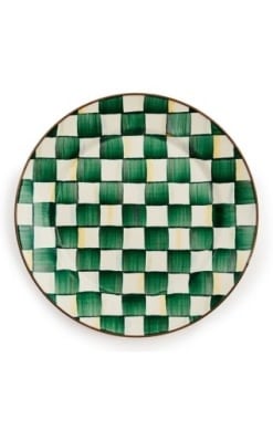 Hand-glazed steel charger plate with emerald check decoration and bronzed stainless steel rim.