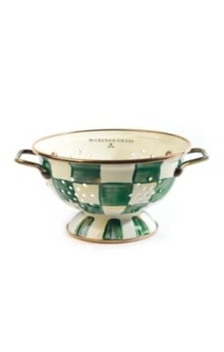 Small hand-glazed steel colander with emerald checkered pattern on antiqued brass handles.