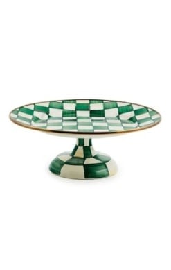 Small pedestal platter with hand-painted emerald check pattern on steel base and bronzed stainless rim.