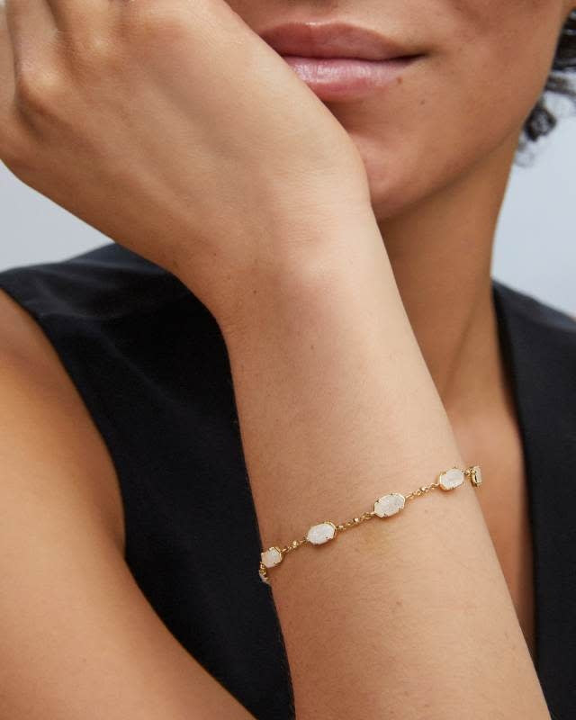 Emilie gold link bracelet featuring iridescent drusy stones on a metallic satellite chain with lobster claw closure.