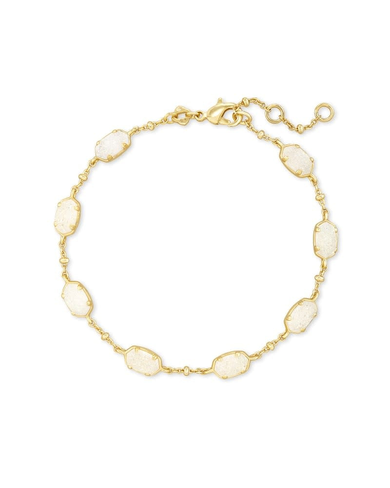 Emilie gold link bracelet featuring iridescent drusy stones on a metallic satellite chain.