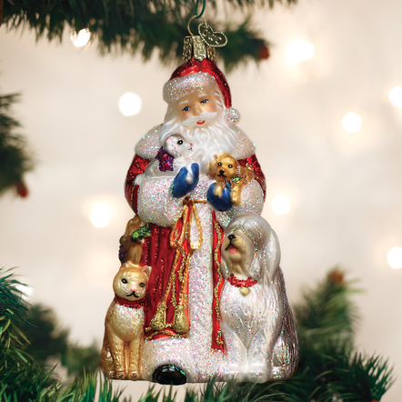 Santa's Furry Friends glass ornament featuring Santa holding a puppy and kitten with two dogs.