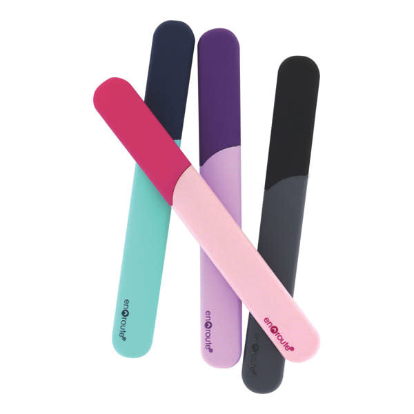 Transparent glass nail file with built-in handle inside a protective travel case