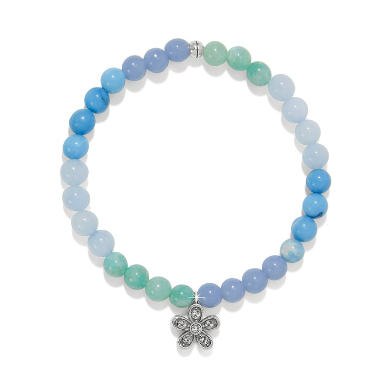 Gold-plated stretch bracelet with purple beads forming a flower shape.
