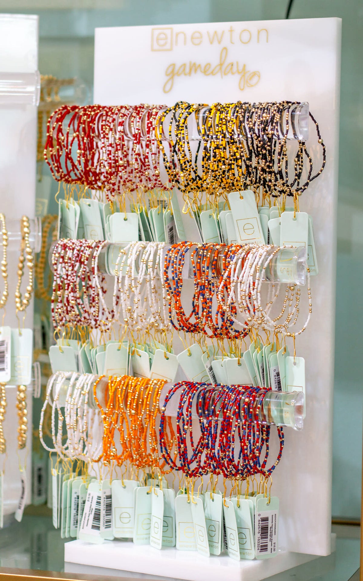 Gameday Hope Unwritten bracelet featuring multicolored seed beads with gold accents on stretch elastic.