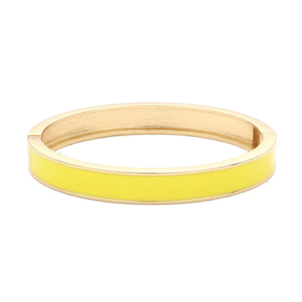 Yellow enamel and gold-toned hinged bangle bracelet.