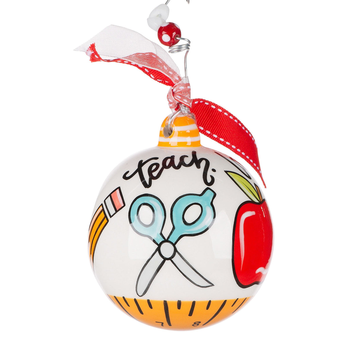 Hand-painted ceramic ornament featuring a heart-shaped silhouette with the text TEACH LOVE INSPIRE in white against a dark background.