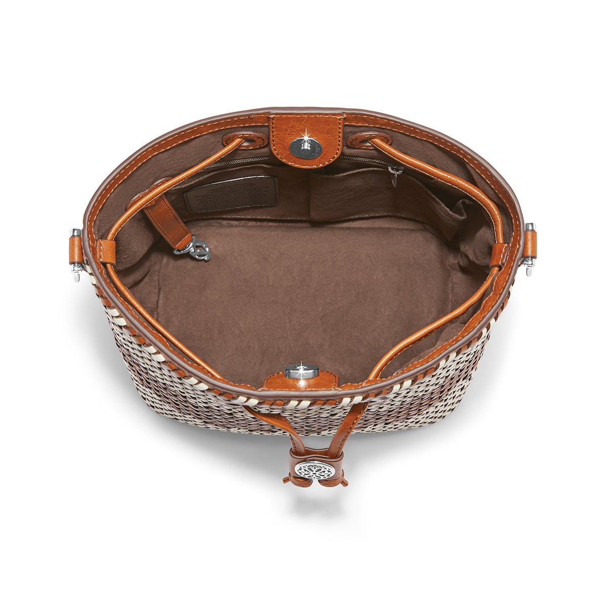 Russet leather Ferrara Cassia bucket bag with magnetic flap closure, adjustable strap, suede-like lining, and protective feet.