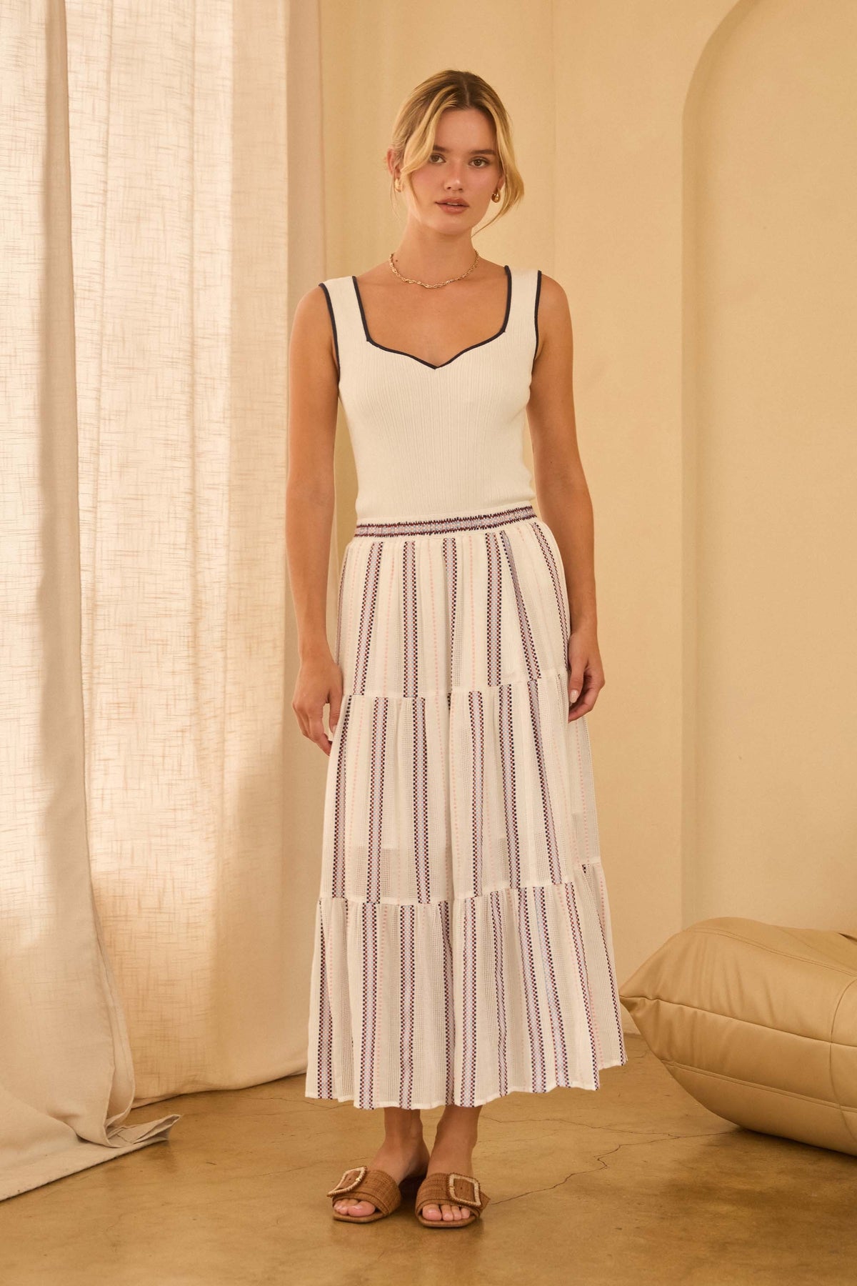 Chloe striped midi skirt with tiered ruffles and a comfortable waistband in soft fabric.