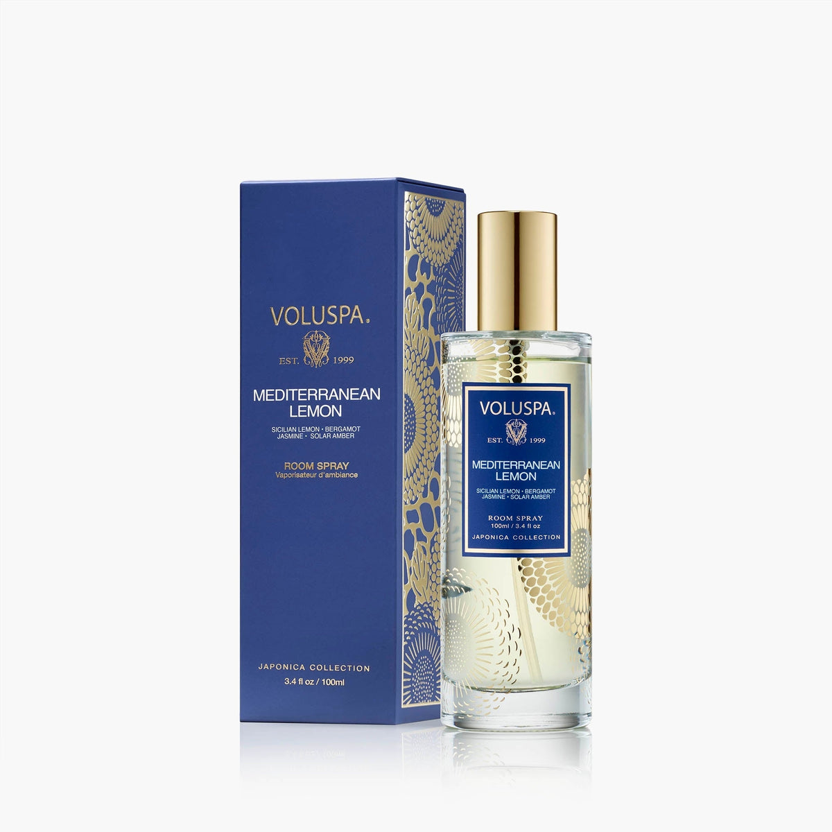 Voluspa Mediterranean Lemon room spray in a glass vessel with gold accents.