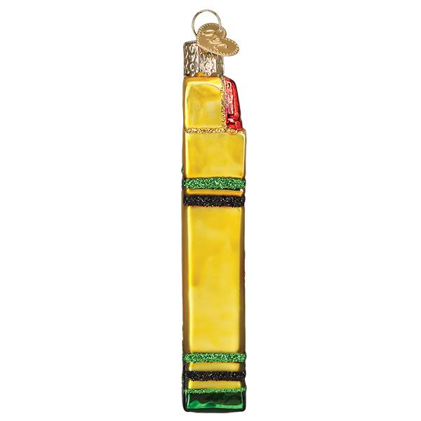 Side view of a yellow glass box of crayons Christmas ornament with green and black glitter stripes.