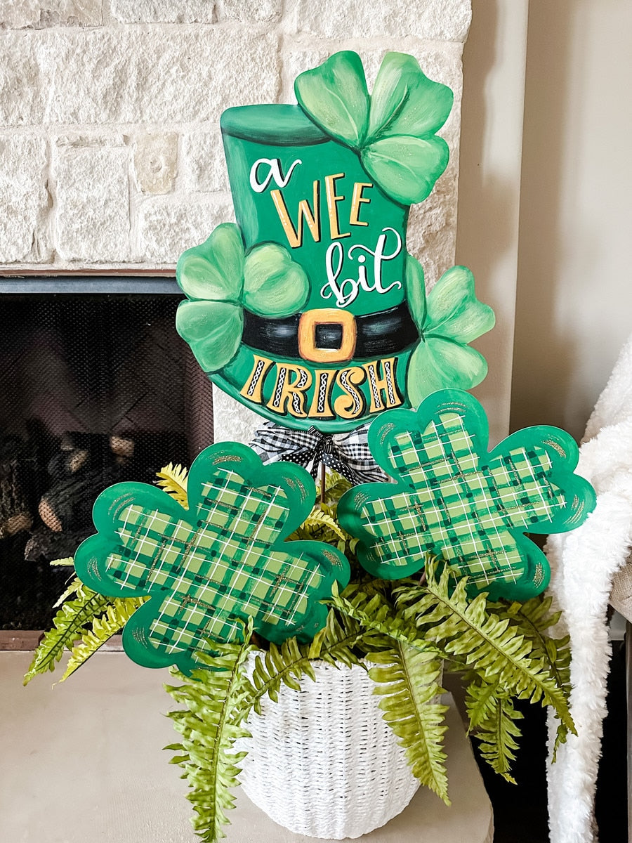 Green felt Irish hat with shamrock embroidery on the brim.