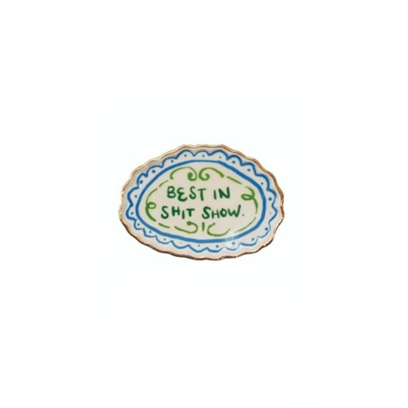Oval stoneware magnet with a gold rim and blue border featuring the text BEST IN SHIT SHOW.