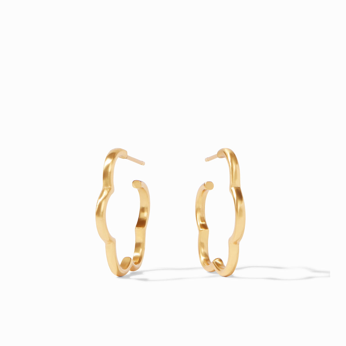 A pair of gold-plated hoop earrings with a scalloped, floral-inspired silhouette.