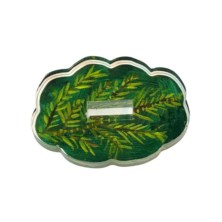 Small acrylic stand with a pine wood grain pattern on top.