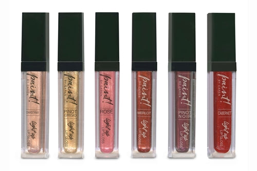 Wine by the Gloss Light up Lip gloss in a clear tube with pink liquid and silver glitter.
