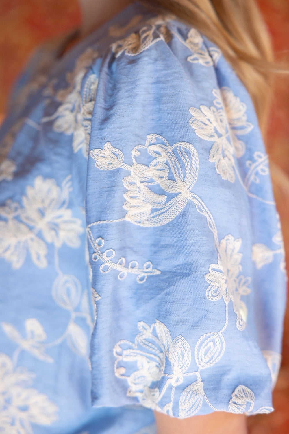 Scarlett floral embroidered bubble sleeve top with round neckline in woven fabric