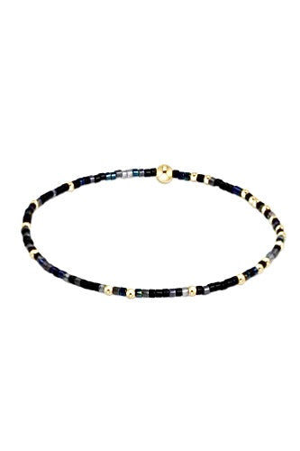 Hope Unwritten bracelet featuring mixed seed beads in various colors with gold-filled accents on elastic cord.