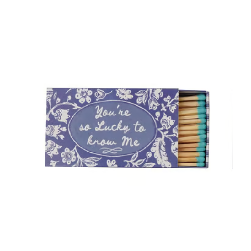 Blue floral matchbox with 'You're so Lucky to know Me' text and teal-tipped safety matches.