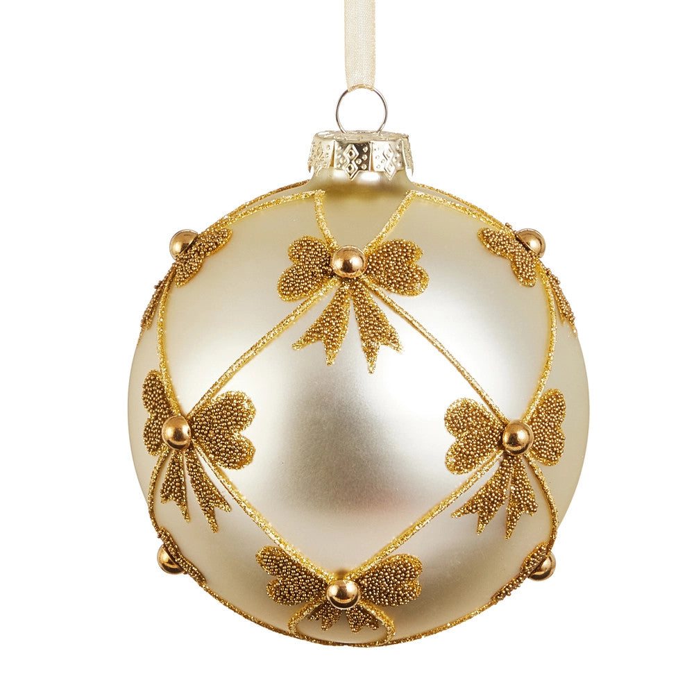 5-inch matte gold glass ball ornament with glittery gold bow accents and diamond pattern.