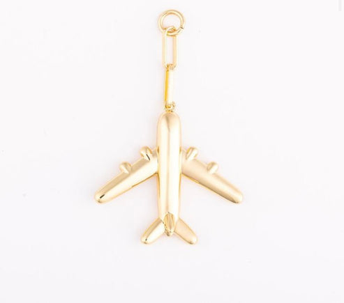 18k gold-plated airplane bag charm icon with a polished finish and attachment link.