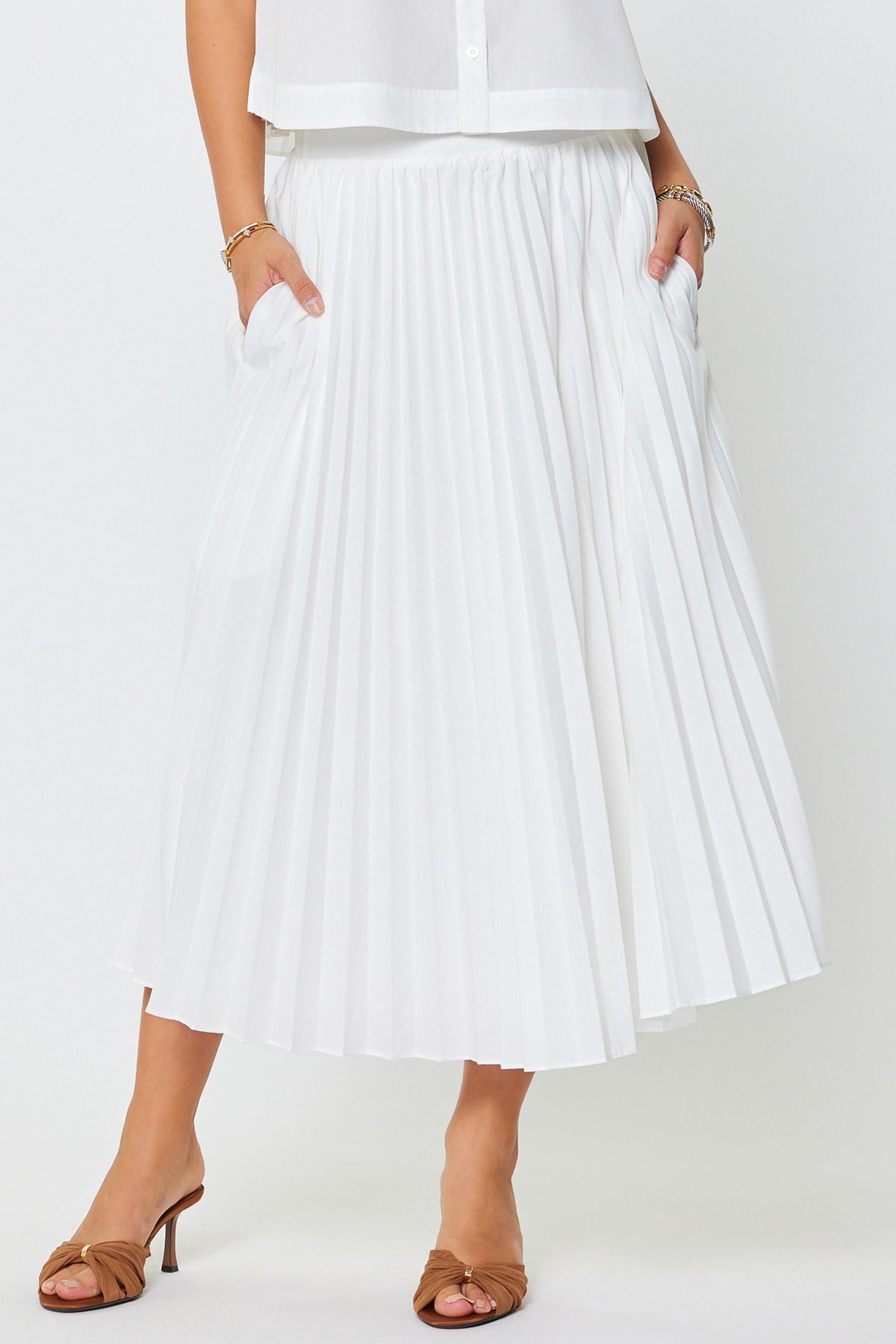 Ivy pleated A-line maxi skirt with smocked back waist in lightweight fabric.