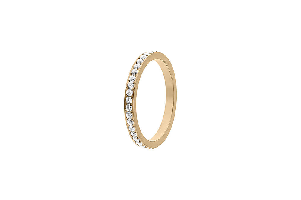 Small eternity ring with a spacer band design in silver-tone metal.