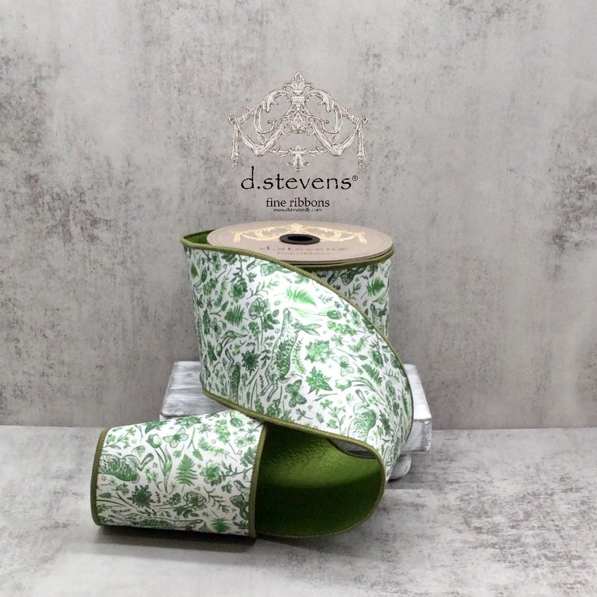 4-inch wide forest green dupion silk fabric with floral rabbit pattern and white ribbon trim