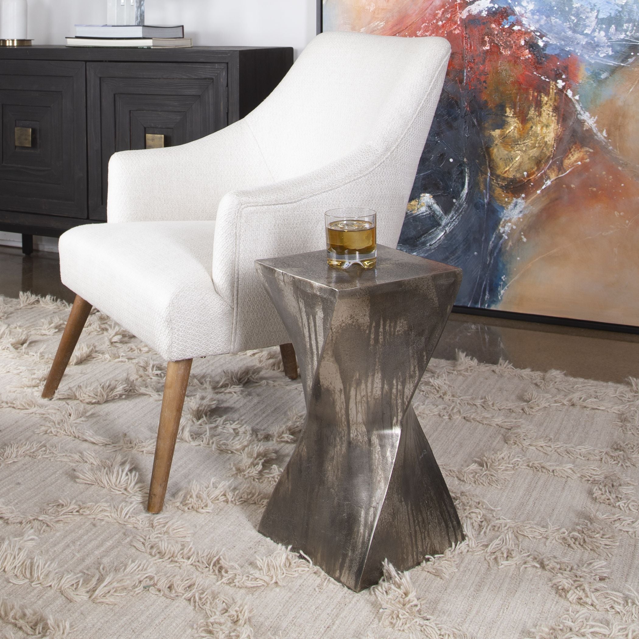 Euphrates accent table with a rectangular wooden top in dark brown finish on four tapered legs.