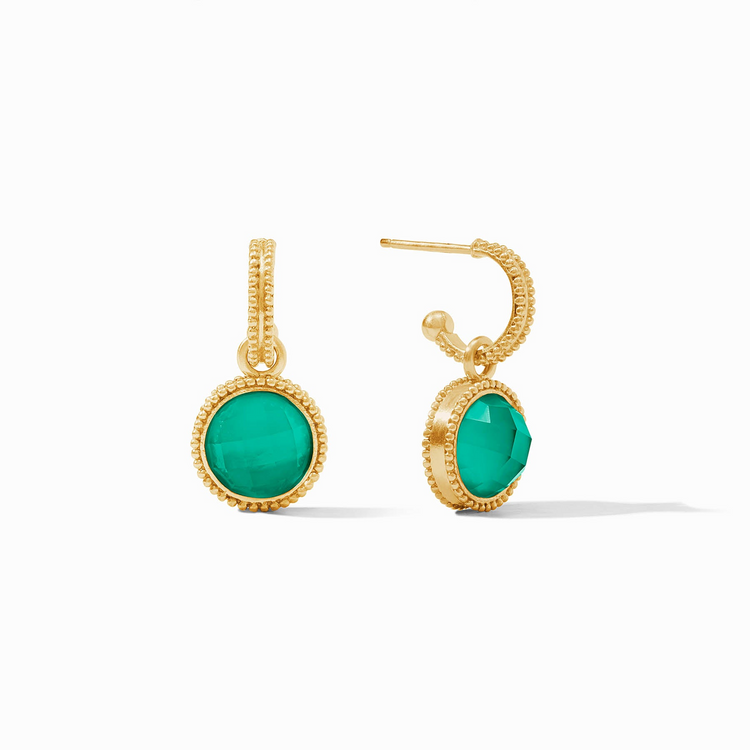 Gold hoop earrings with round, faceted green glass charms and beaded texture.