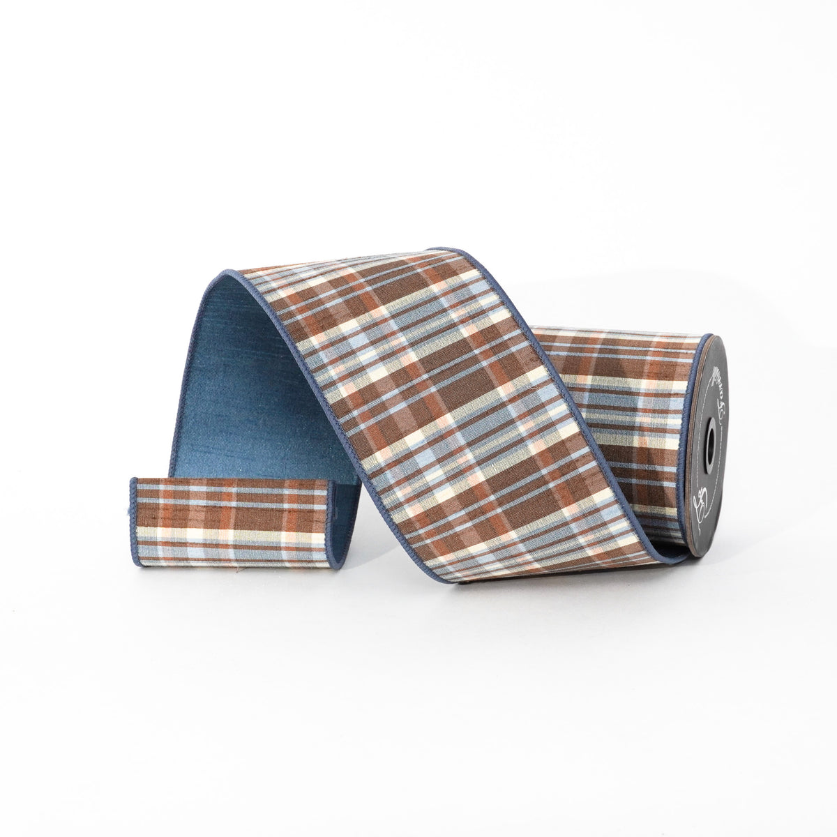 Roll of Christmas plaid ribbon in brown, blue, and white with a solid blue reverse side.