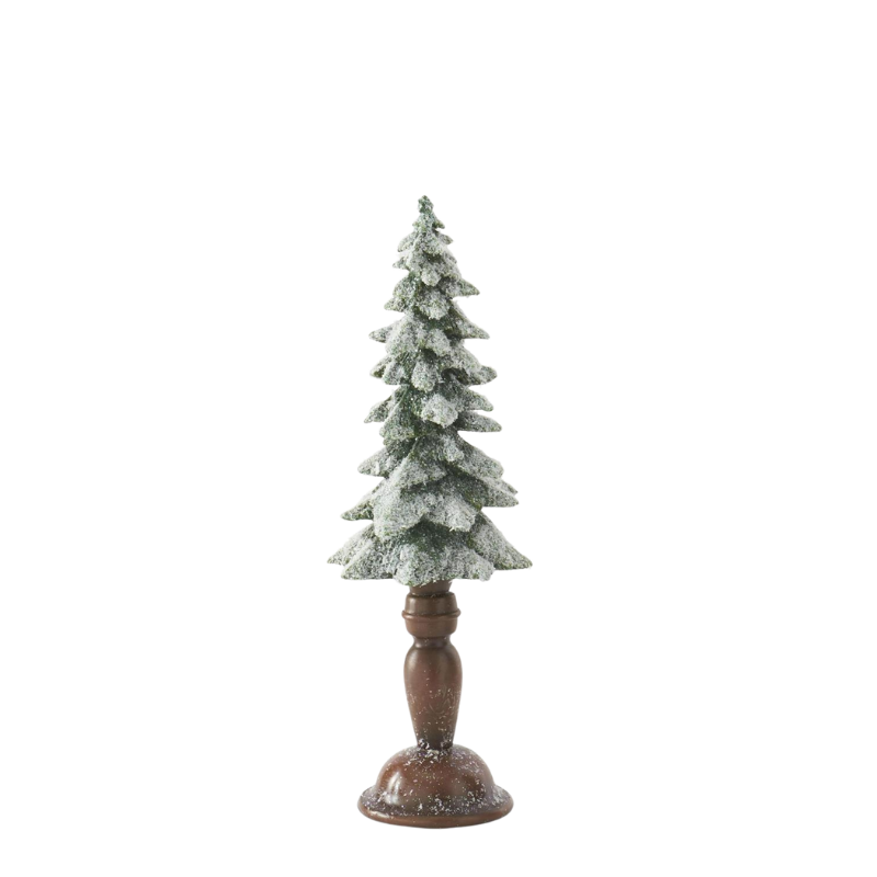 Flocked and glittered resin Christmas tree on a brown pedestal base.